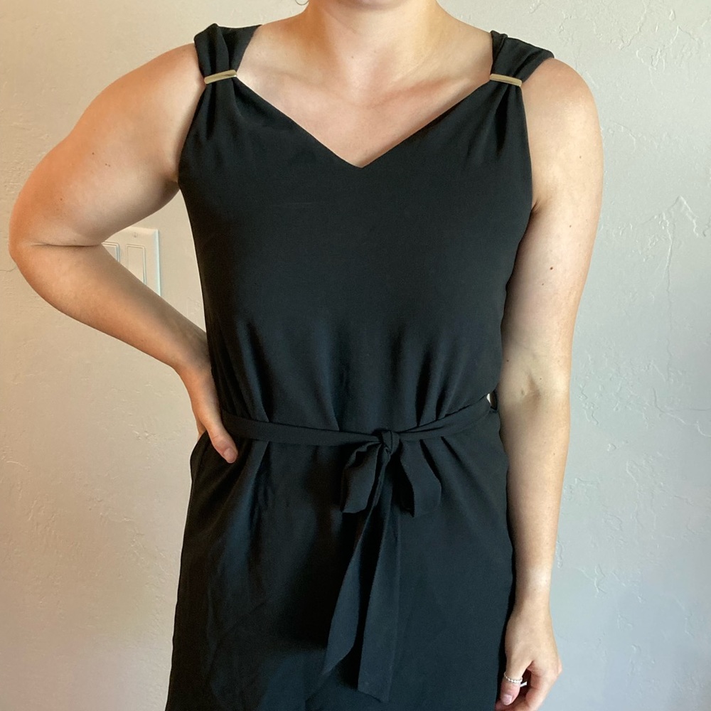 Black chiffon, tie waisted cocktail dress.